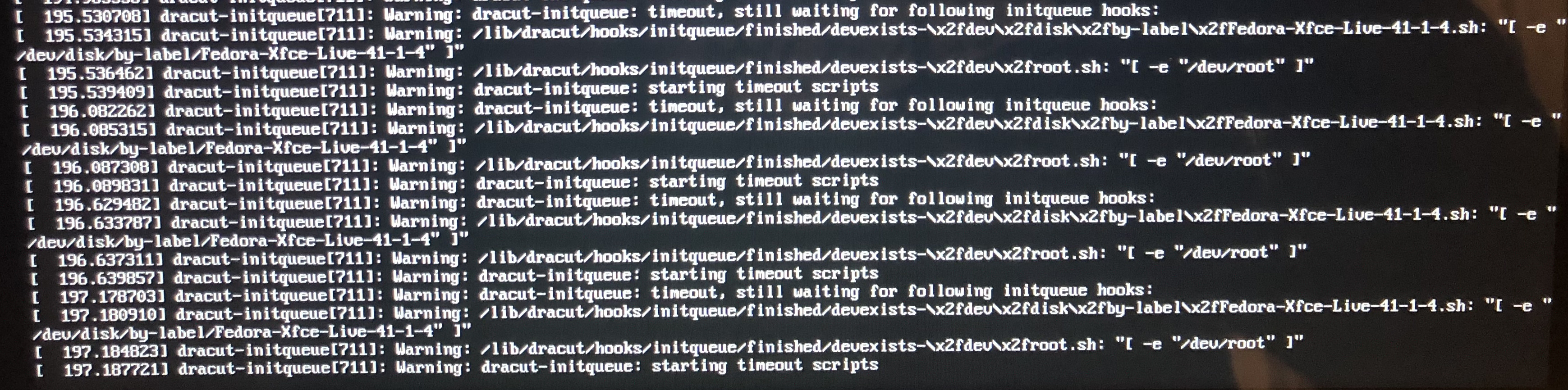 an image of a Linux terminal outputting error messages relating to dracut-initqueue